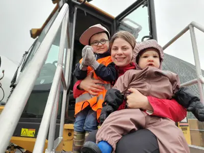 family in a truck cab