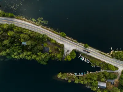 Arial shot of a road between two bodies of water