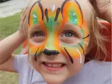 Child with face painted