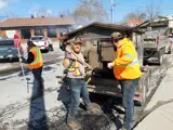 Roads crews fixing potholes