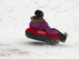 girl snow tubing
